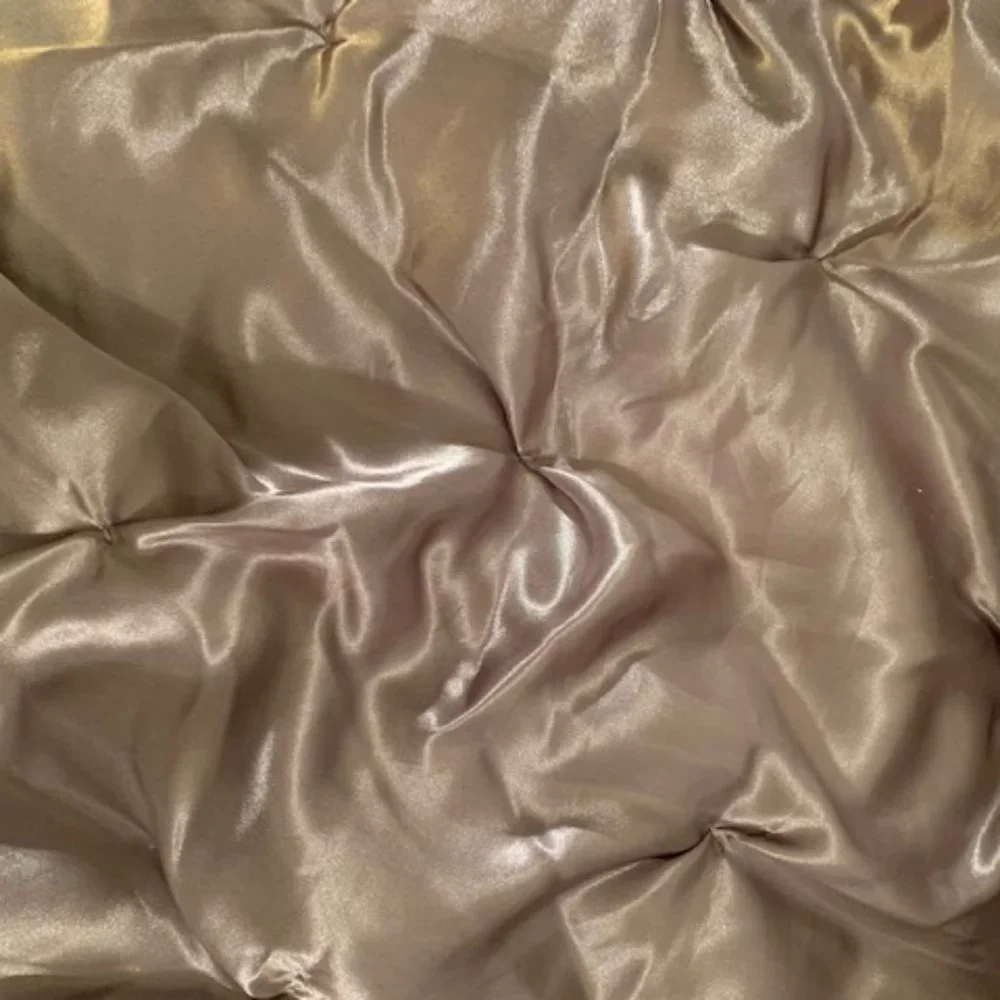 Grey satin-like pillow sham